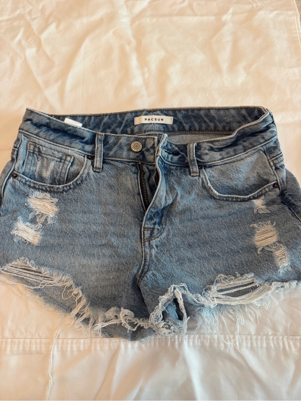 PacSun Women's Distressed Denim Shorts in Faded Blue